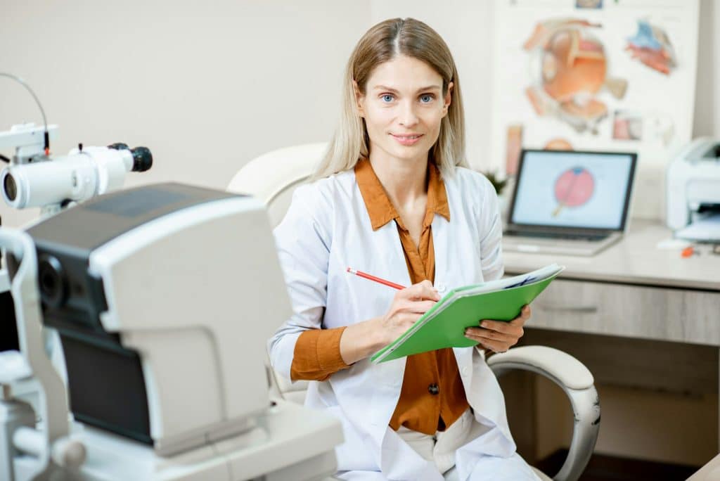 Ophthalmologist working in the office